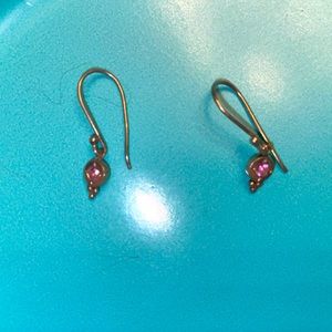Silver dangle earrings with pink gem